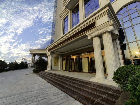 Imagen de los exteriores del Hotel Tianyu Fields International. Foto 6