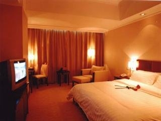 Imagen de la habitación del Hotel Tianyu Gloria Grand. Foto 9