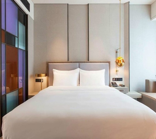 Imagen de la habitación del Hotel Tianyuan. Foto 6