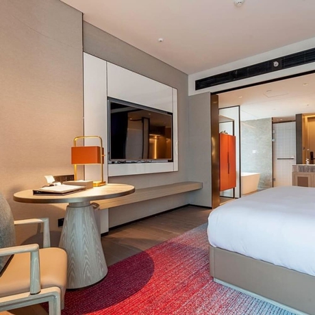 Imagen de la habitación del Hotel Tianyuan. Foto 7