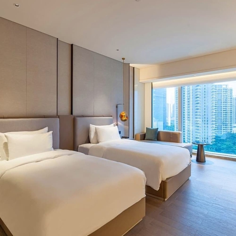 Imagen de la habitación del Hotel Tianyuan. Foto 8