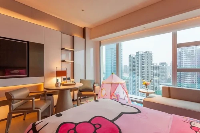 Imagen de la habitación del Hotel Tianyuan. Foto 11