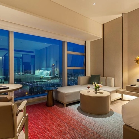 Imagen de la habitación del Hotel Tianyuan. Foto 13