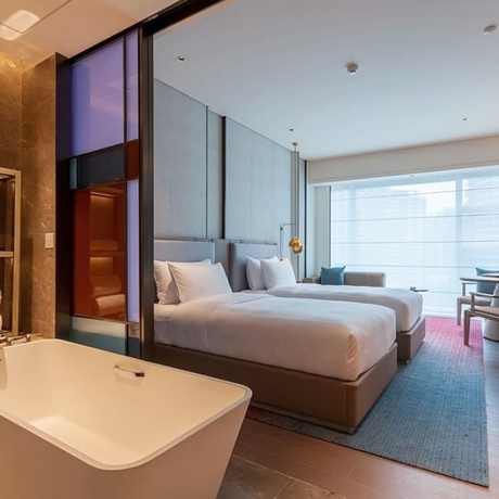 Imagen de la habitación del Hotel Tianyuan. Foto 14