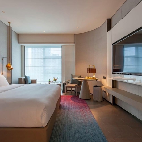 Imagen de la habitación del Hotel Tianyuan. Foto 15