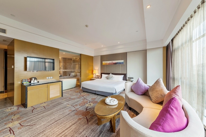 Imagen de la habitación del Hotel Tianyuan Junlong. Foto 3