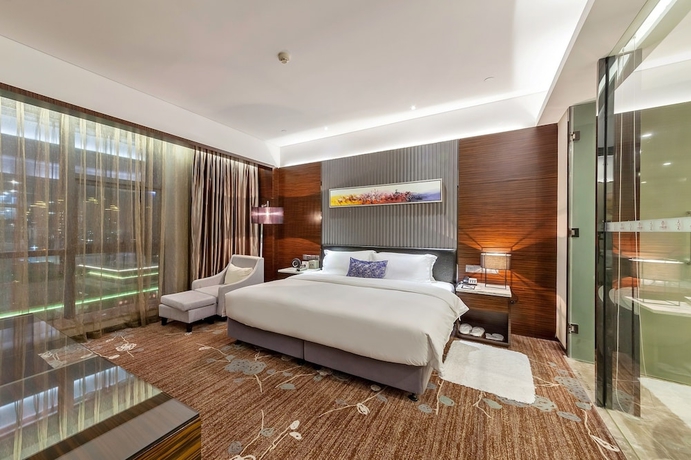 Imagen de la habitación del Hotel Tianyuan Junlong. Foto 8