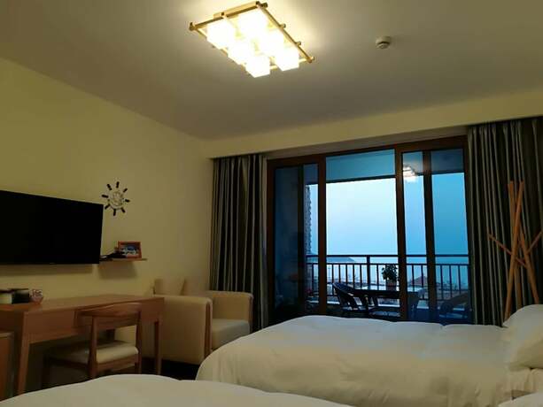 Imagen de la habitación del Hotel Tianyue Bay Bihai Lantian. Foto 15