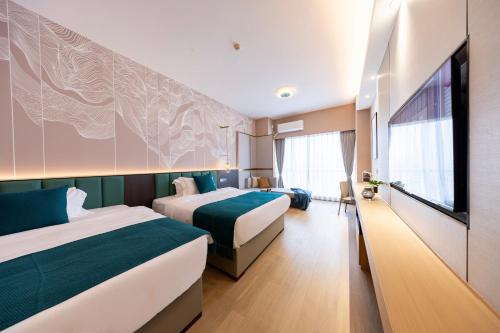 Imagen de la habitación del Hotel Tianyue S. Foto 19