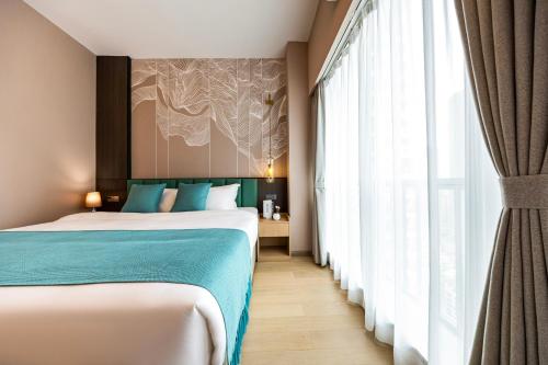 Imagen de la habitación del Hotel Tianyue S. Foto 20