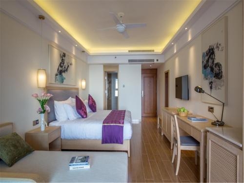 Imagen de la habitación del Hotel Tianze Beach Resort Sanya. Foto 7