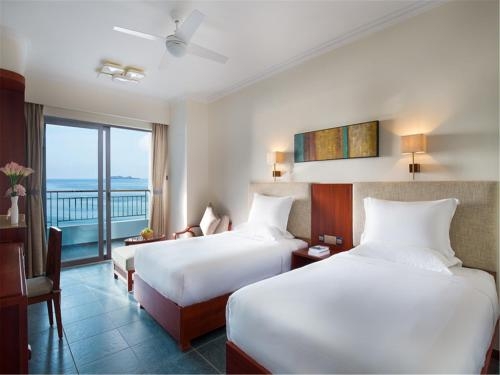 Imagen de la habitación del Hotel Tianze Beach Resort Sanya. Foto 8