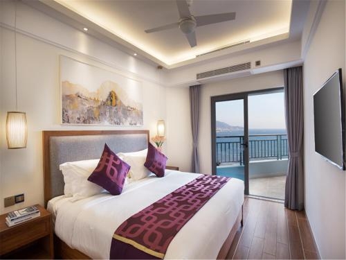 Imagen de la habitación del Hotel Tianze Beach Resort Sanya. Foto 9