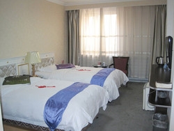 Imagen de la habitación del Hotel Tianzhi Harbin. Foto 3
