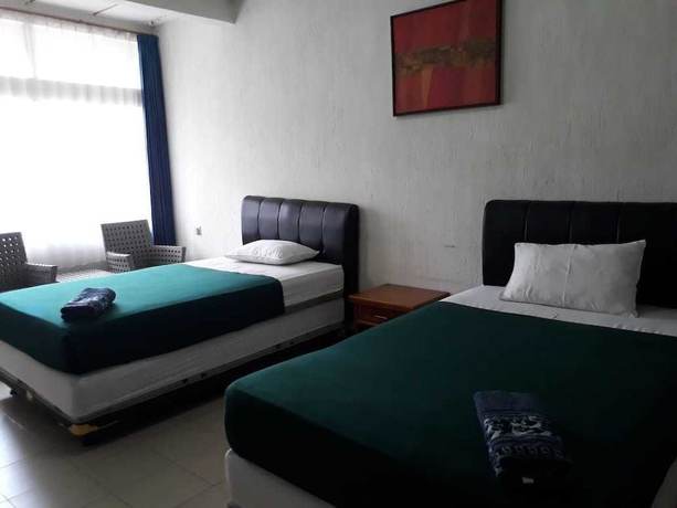 Imagen de la habitación del Hotel Tiara, Haurpanggung. Foto 7