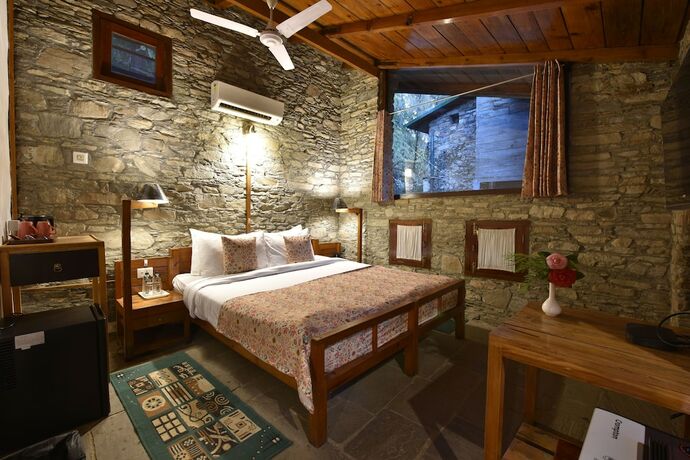 Imagen de la habitación del Hotel Tiaraa Monolith Lake Resort. Foto 7