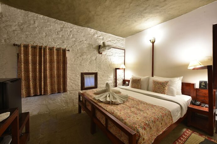 Imagen de la habitación del Hotel Tiaraa Monolith Lake Resort. Foto 8