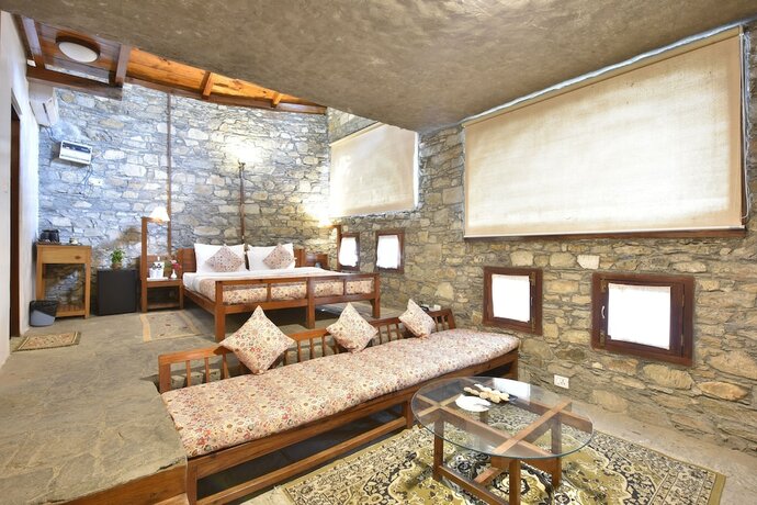 Imagen de la habitación del Hotel Tiaraa Monolith Lake Resort. Foto 9
