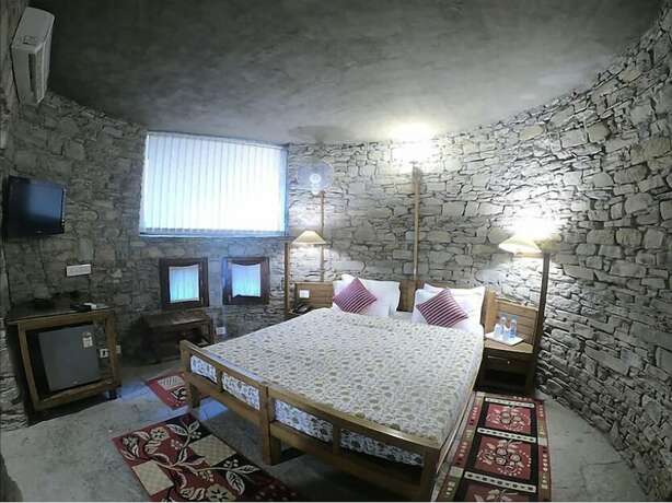 Imagen de la habitación del Hotel Tiaraa Monolith Lake Resort. Foto 10