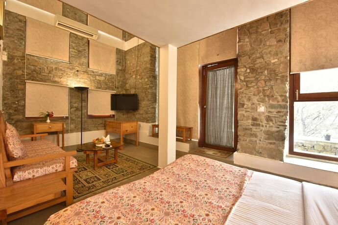 Imagen de la habitación del Hotel Tiaraa Monolith Lake Resort. Foto 11