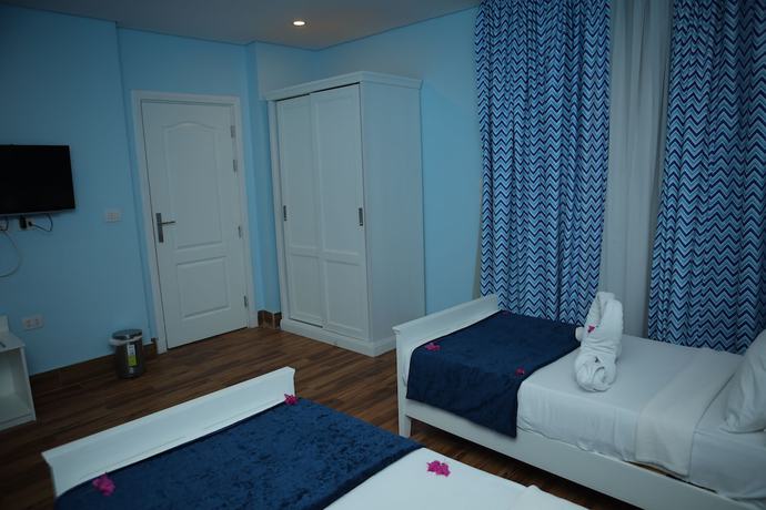 Imagen de la habitación del Hotel Tiba Rose Plaza. Foto 14
