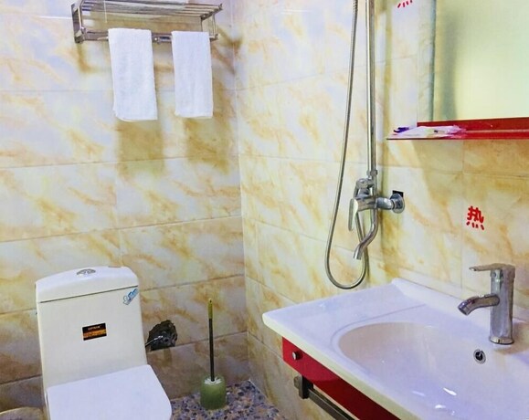 Imagen de la habitación del Hotel Tibet Guest House, Shangri-La. Foto 4