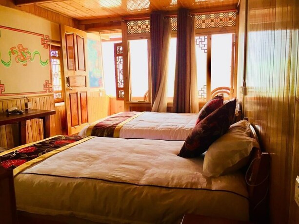 Imagen de la habitación del Hotel Tibet Guest House, Shangri-La. Foto 5