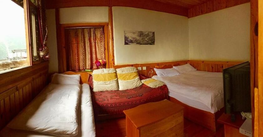 Imagen de la habitación del Hotel Tibet Guest House, Shangri-La. Foto 6