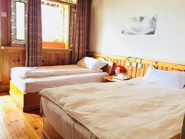Imagen de la habitación del Hotel Tibet Guest House, Shangri-La. Foto 7
