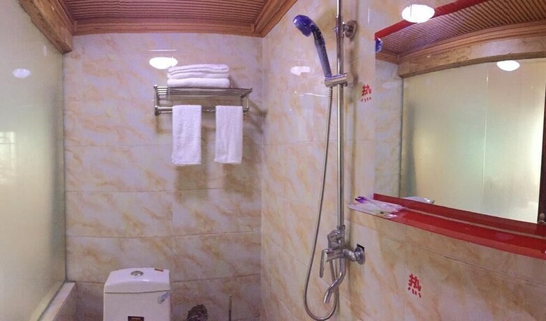 Imagen de la habitación del Hotel Tibet Guest House, Shangri-La. Foto 8