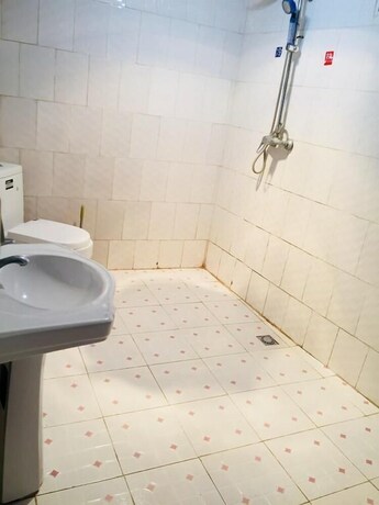 Imagen de la habitación del Hotel Tibet Guest House, Shangri-La. Foto 12
