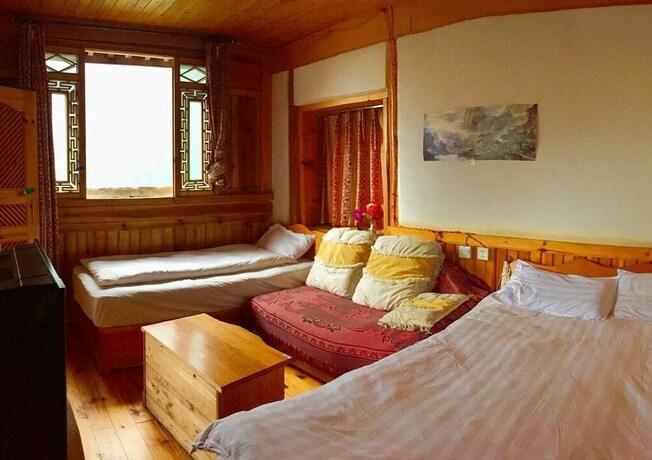 Imagen de la habitación del Hotel Tibet Guest House, Shangri-La. Foto 14