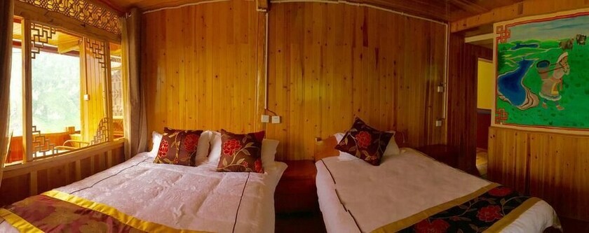 Imagen de la habitación del Hotel Tibet Guest House, Shangri-La. Foto 15