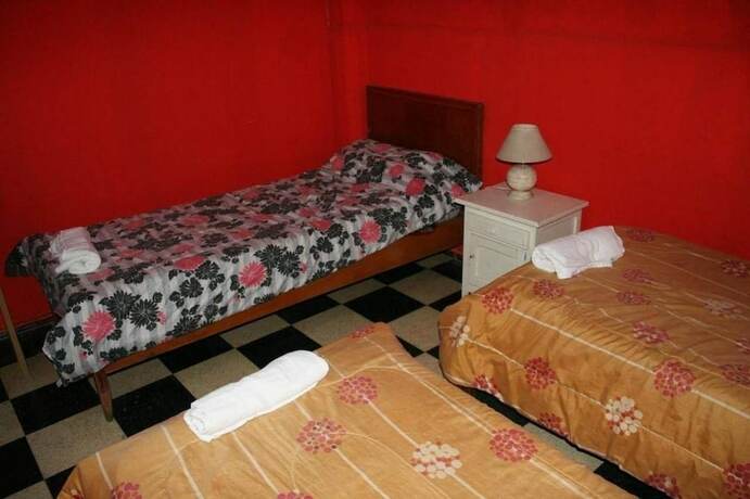 Imagen de la habitación del Hotel Tibet House. Foto 15