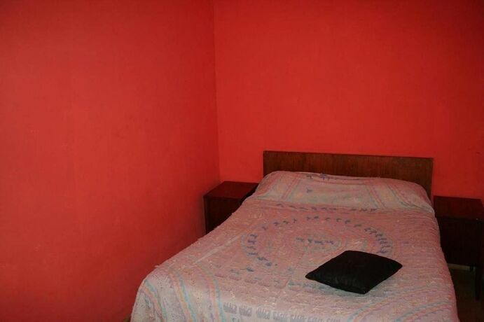 Imagen de la habitación del Hotel Tibet House. Foto 16