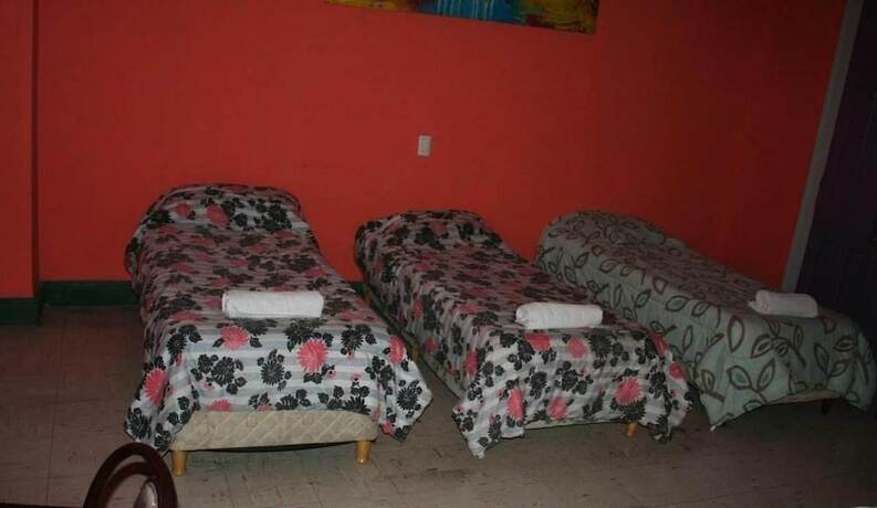 Imagen de la habitación del Hotel Tibet House. Foto 17