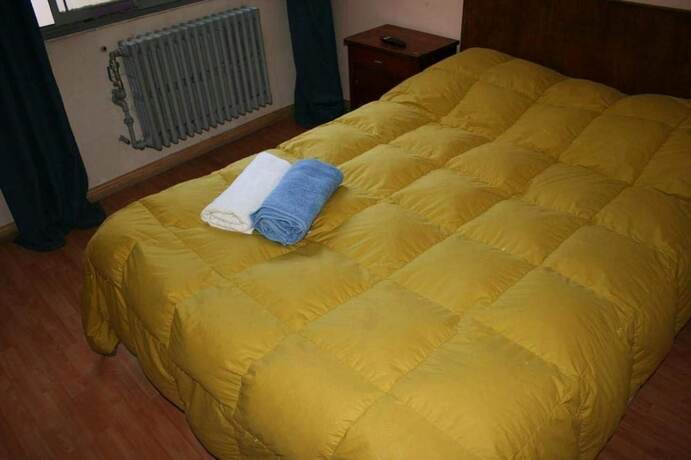 Imagen de la habitación del Hotel Tibet House. Foto 18