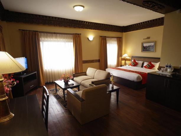 Imagen de la habitación del Hotel Tibet International. Foto 11