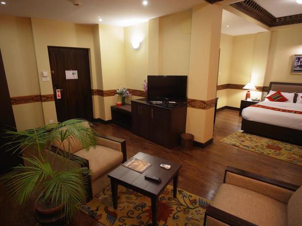 Imagen de la habitación del Hotel Tibet International. Foto 12