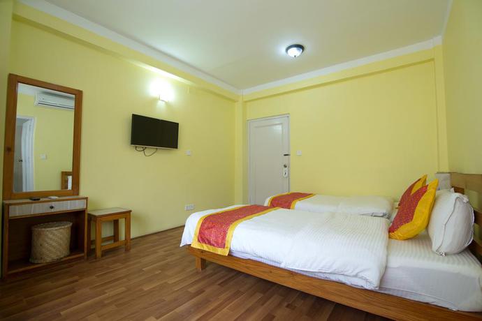 Imagen de la habitación del Hotel Tibet Peace Inn. Foto 3