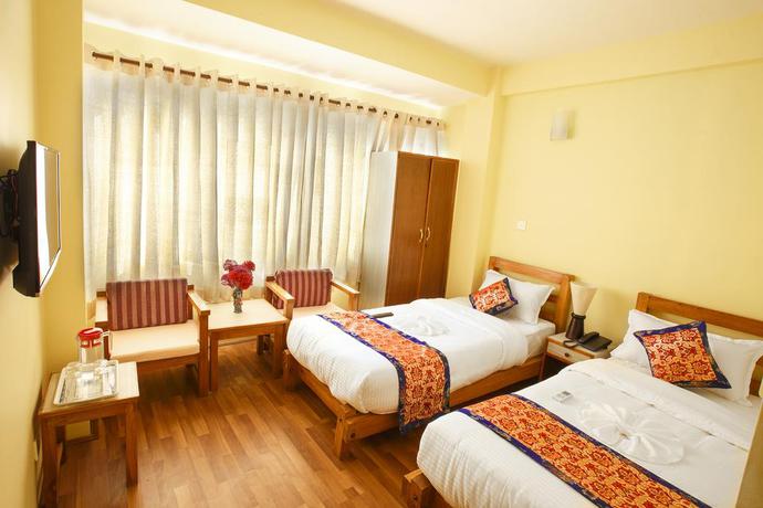Imagen de la habitación del Hotel Tibet Peace Inn. Foto 5