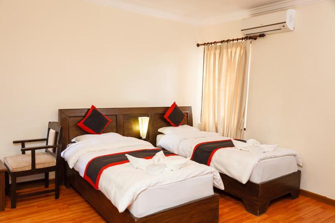 Imagen de la habitación del Hotel Tibet Peace Inn. Foto 9
