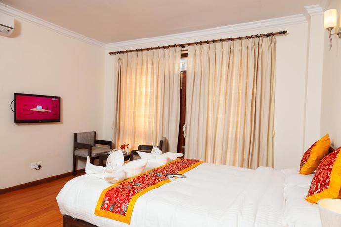 Imagen de la habitación del Hotel Tibet Peace Inn. Foto 11