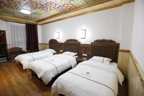 Imagen de la habitación del Hotel Tibetan Family. Foto 6