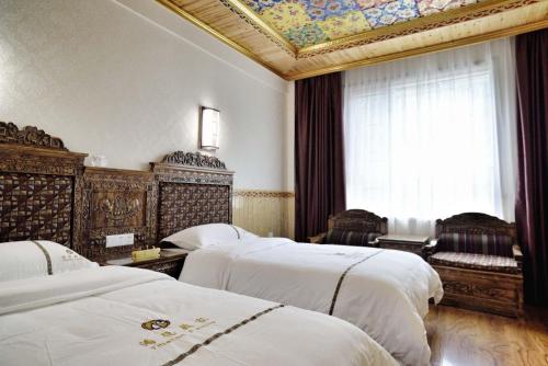 Imagen de la habitación del Hotel Tibetan Family. Foto 7