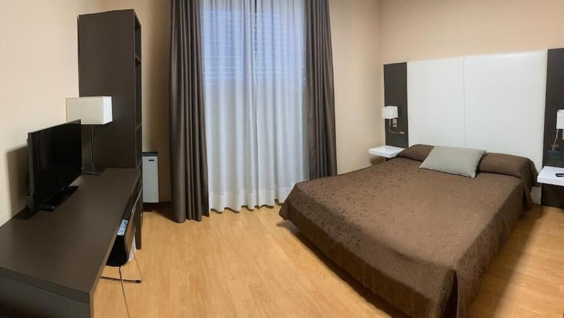 Imagen de la habitación del Hotel Tiby. Foto 10