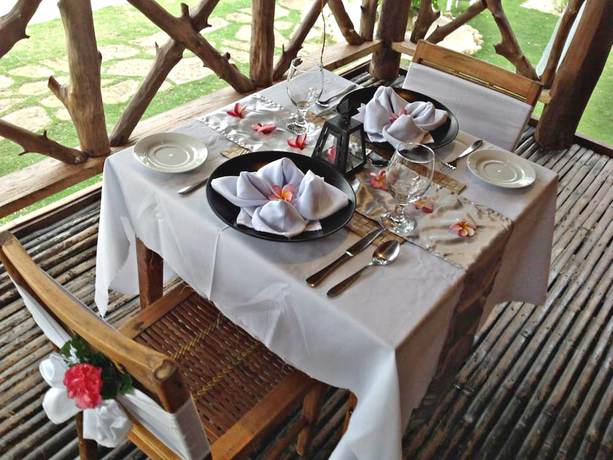 Imagen del bar/restaurante del Hotel Ticao Island Resort. Foto 8