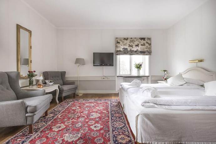 Imagen de la habitación del Hotel Tidaholm Stadshotell. Foto 13