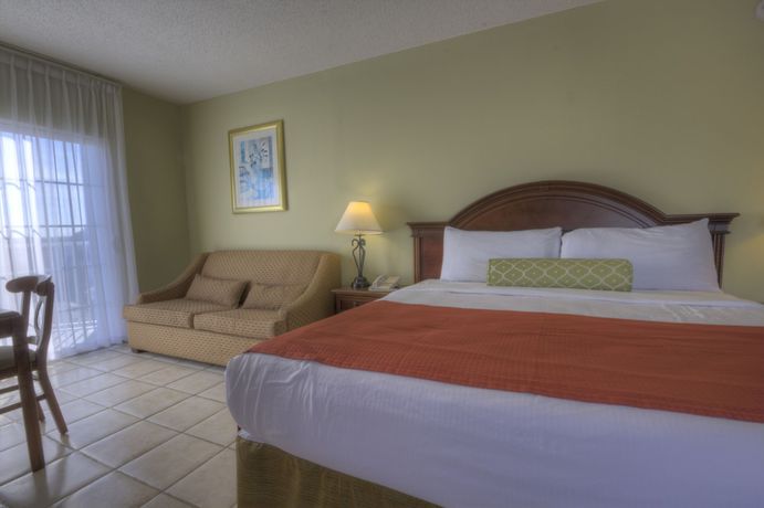Imagen de la habitación del Hotel Tidelands Caribbean And Suites. Foto 13