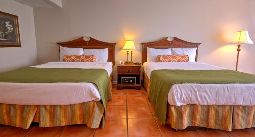 Imagen de la habitación del Hotel Tidelands Caribbean Boardwalk and Suites. Foto 5